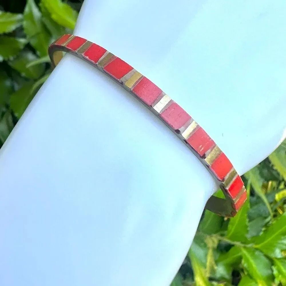 Red and gold tone brass bangle bracelet